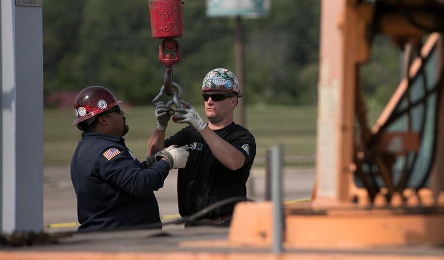 UA workers using a crane